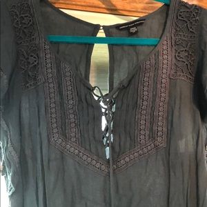 navy romper with ruffle sleeves & eyelet back